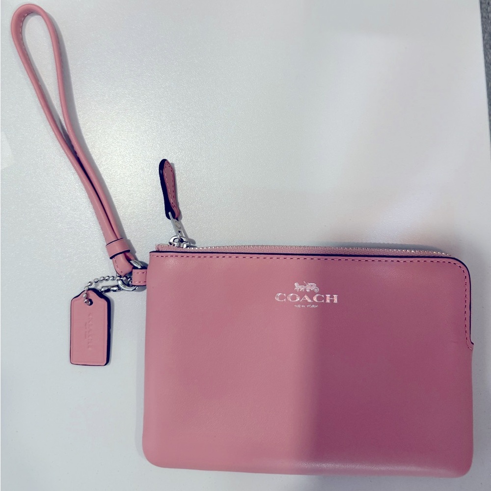 Leather Coach Wristlet in terracotta